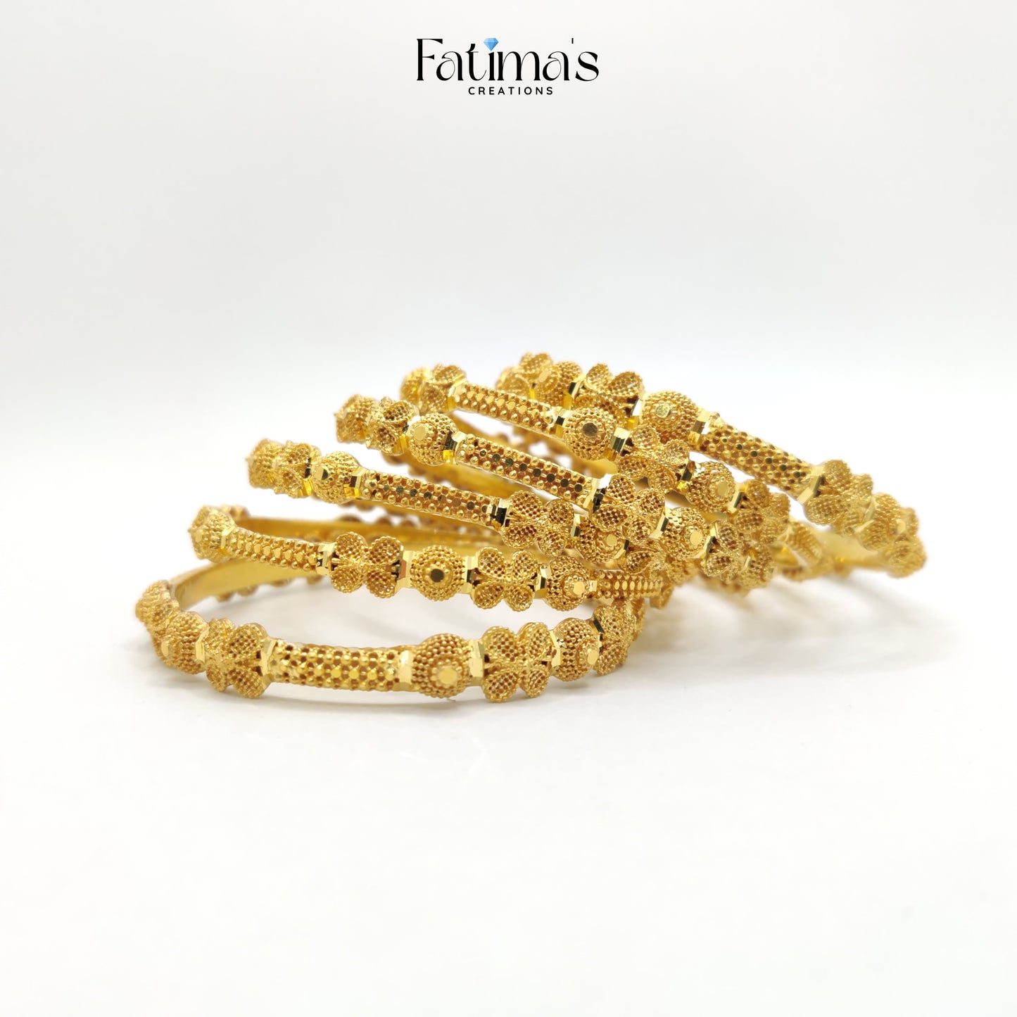 Golden Blooms Bangles – Floral Gold Plated Artificial Bangles for Bridal & Festive Wear
